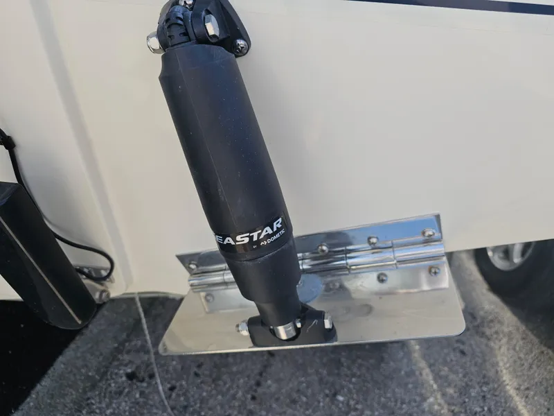 Slide: The Image of 2024 Scout Honda Seabrook 195 CF hydraulic component detail on boat exterior. - 32