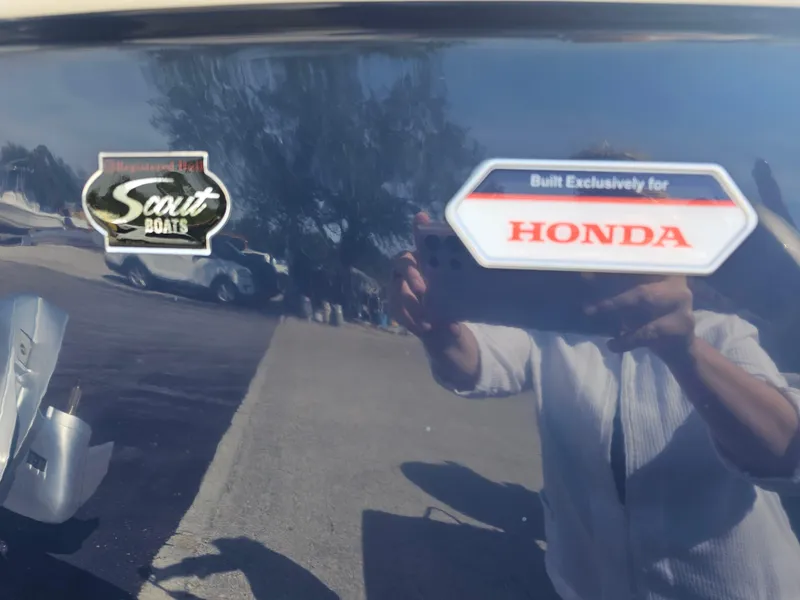 Slide: The Image of 2024 Scout Honda Seabrook 195 CF boat with exclusive Honda branding. - 33
