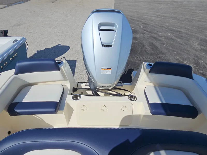 Slide: The Image of 2024 Scout Honda Seabrook 195 CF boat engine and seating area. - 7