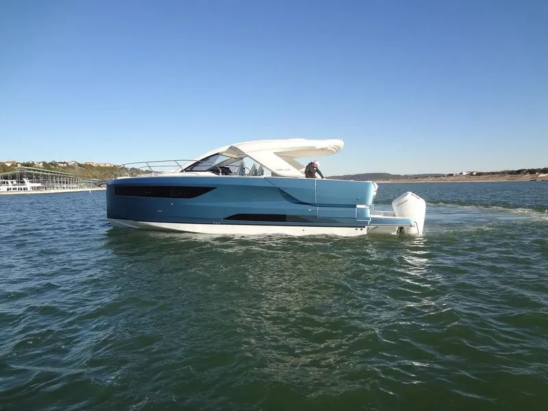 Slide: The Image of 2025 Jeanneau DB/43 OB yacht cruising on open water. - 32