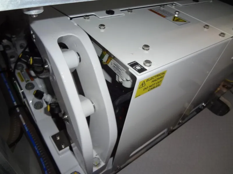 Slide: The Image of Engine compartment of 2025 Jeanneau DB/43 OB boat, showing electrical components. - 45