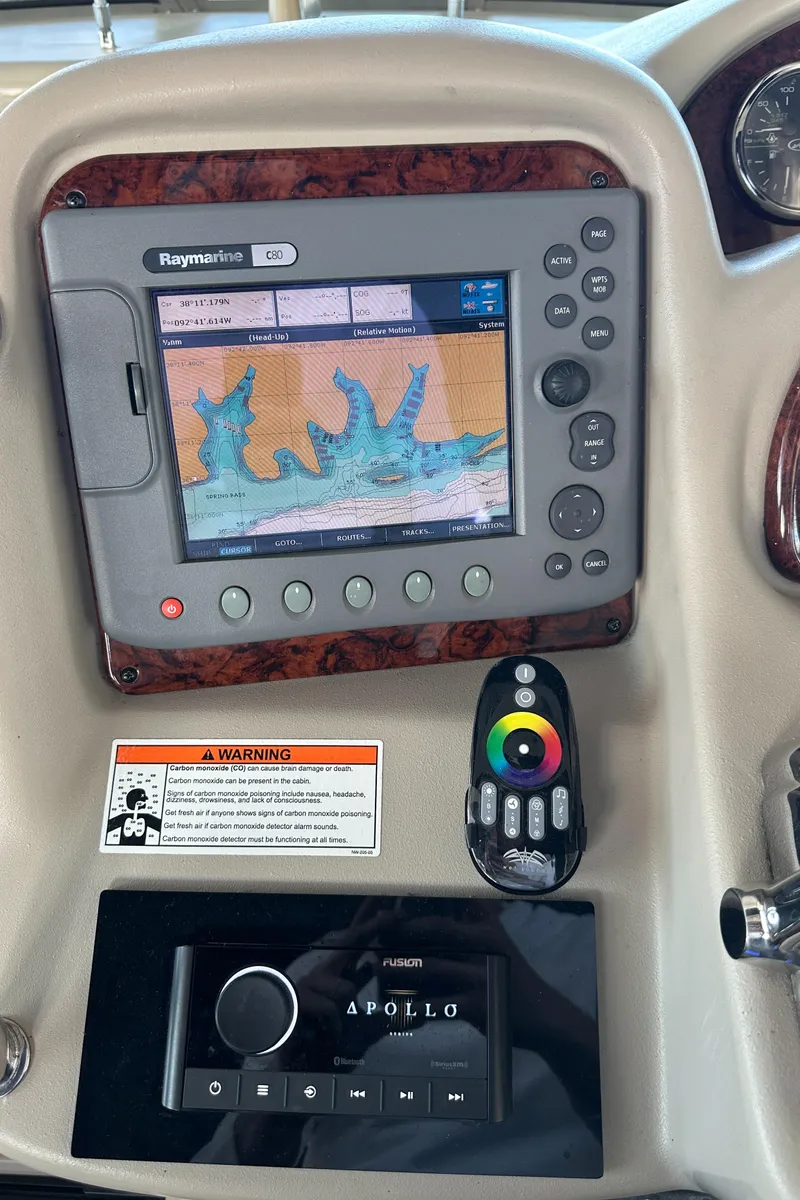 Slide: The Image of Control panel of 2008 Sea Ray 340 Sundancer with navigation and audio systems. - 12
