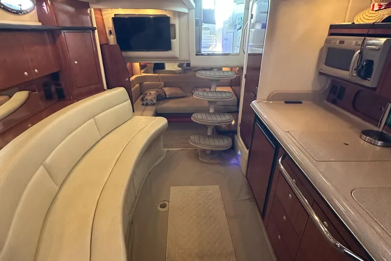 Slide: The Image of Interior of 2008 Sea Ray 340 Sundancer yacht with modern amenities and elegant design. - 17