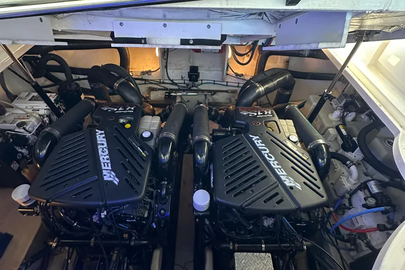 Slide: The Image of Engine room of 2008 Sea Ray 340 Sundancer with twin Mercury engines. - 25