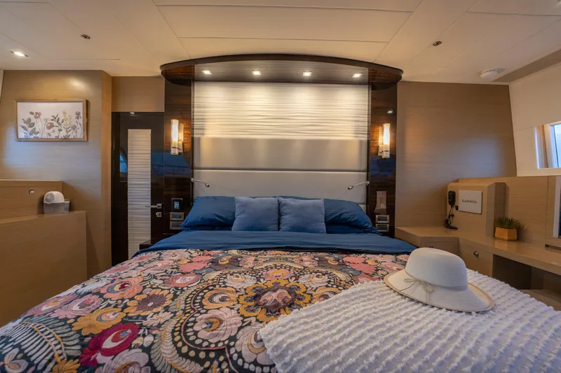 Slide: The Image of Luxurious bedroom interior of 2020 Horizon PC60 yacht with elegant decor and ambient lighting. - 19