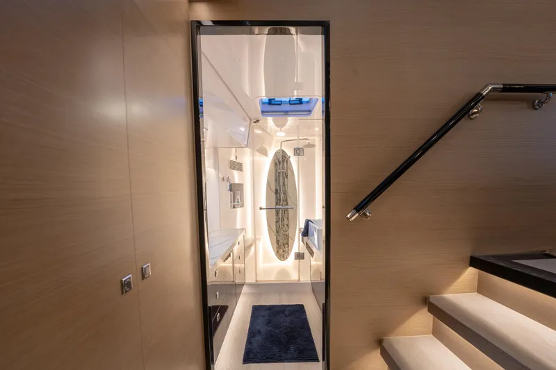 Slide: The Image of Luxurious interior of 2020 Horizon PC60 yacht with modern design and elegant staircase. - 22