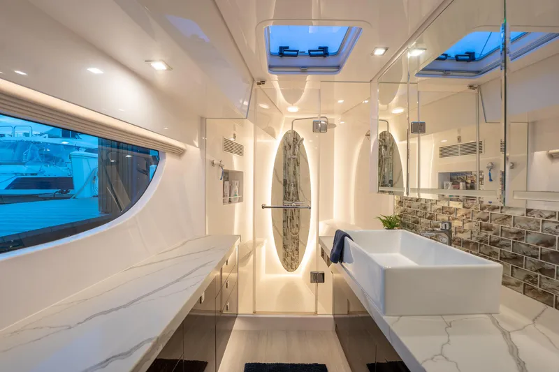 Slide: The Image of Luxurious Horizon PC60 yacht bathroom, 2020 model, featuring modern design and elegant fixtures. - 23