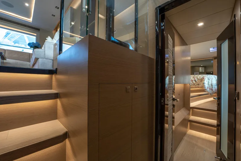 Slide: The Image of Luxurious interior of 2020 Horizon PC60 yacht with modern design and ambient lighting. - 27