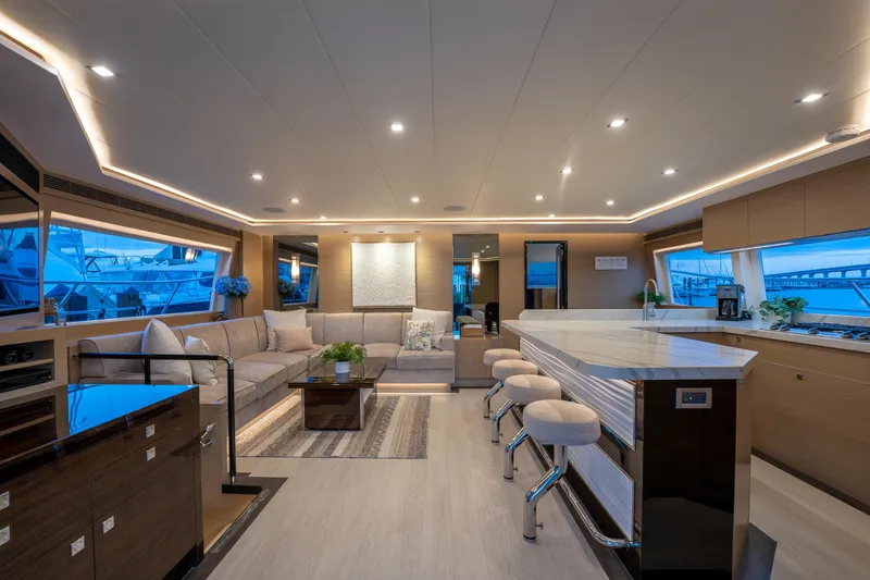 Slide: The Image of Luxurious interior of 2020 Horizon PC60 yacht with modern seating and elegant lighting. - 3