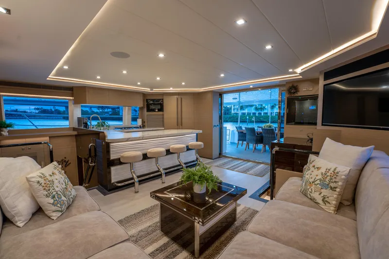 Slide: The Image of Luxurious interior of 2020 Horizon PC60 yacht with modern kitchen and seating area. - 5