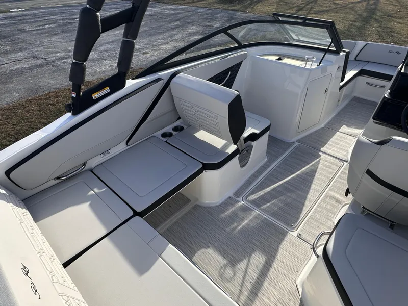 Slide: The Image of 2024 Sea Ray SPX 210 OB interior, featuring sleek seating and modern design elements. - 7