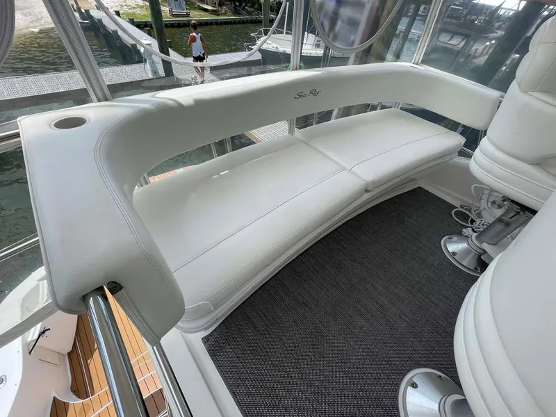 Slide: The Image of White seating area on 2003 Sea Ray 560 Sedan Bridge yacht. - 15