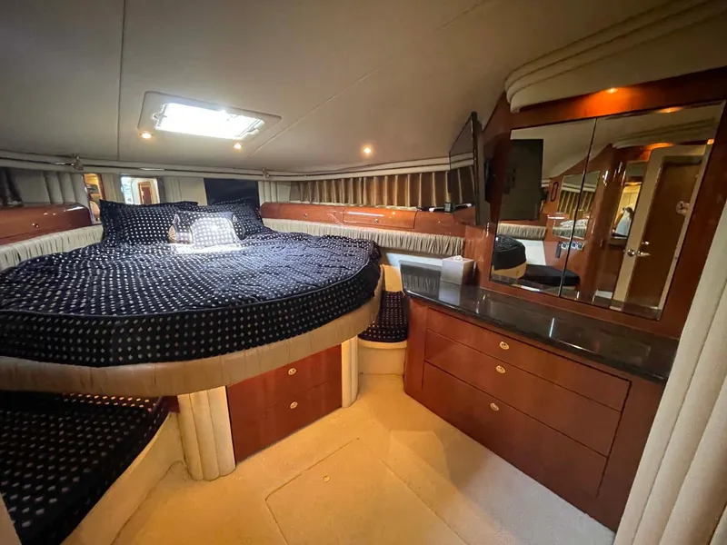 Slide: The Image of Luxurious cabin interior of a 2003 Sea Ray 560 Sedan Bridge yacht. - 35