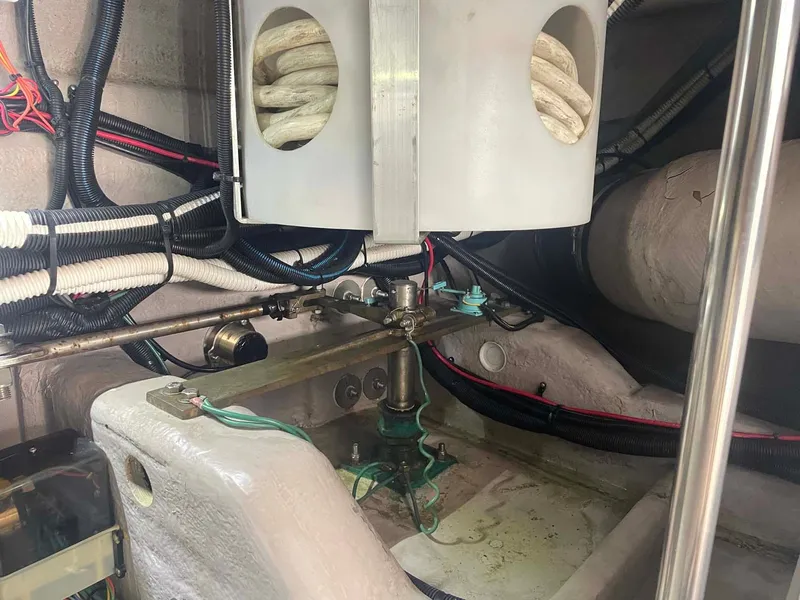 Slide: The Image of Engine room of 2003 Sea Ray 560 Sedan Bridge with visible wiring and components. - 41