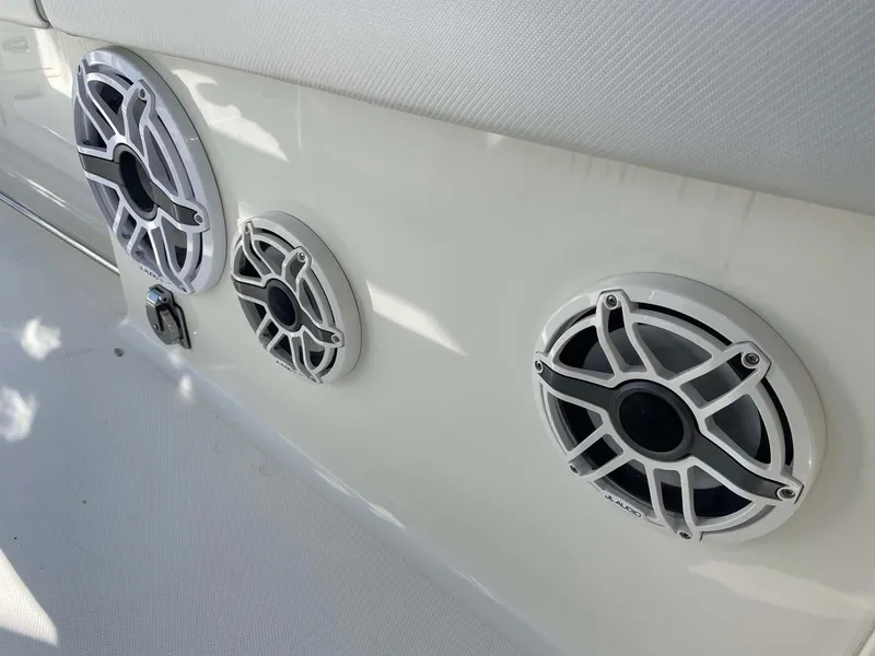 Slide: The Image of Speakers on 2015 Hydra-Sports 3400 Center Console boat interior. - 15