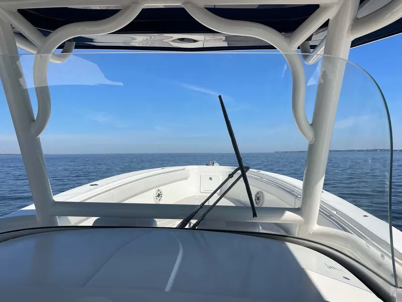 Slide: The Image of 2015 Hydra-Sports 3400 Center Console boat on open water, clear blue sky. - 17