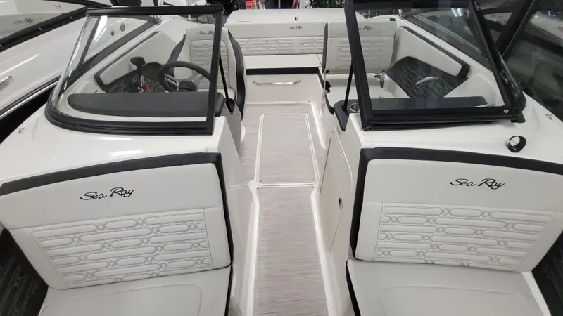 Slide: The Image of 2025 Sea Ray SPX 190 OB boat interior with sleek seating and modern design. - 9
