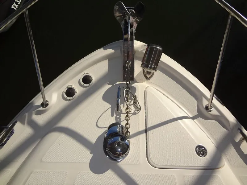 Slide: The Image of Bow of 2005 Sea Ray 320 Sundancer with anchor and chain detail. - 22