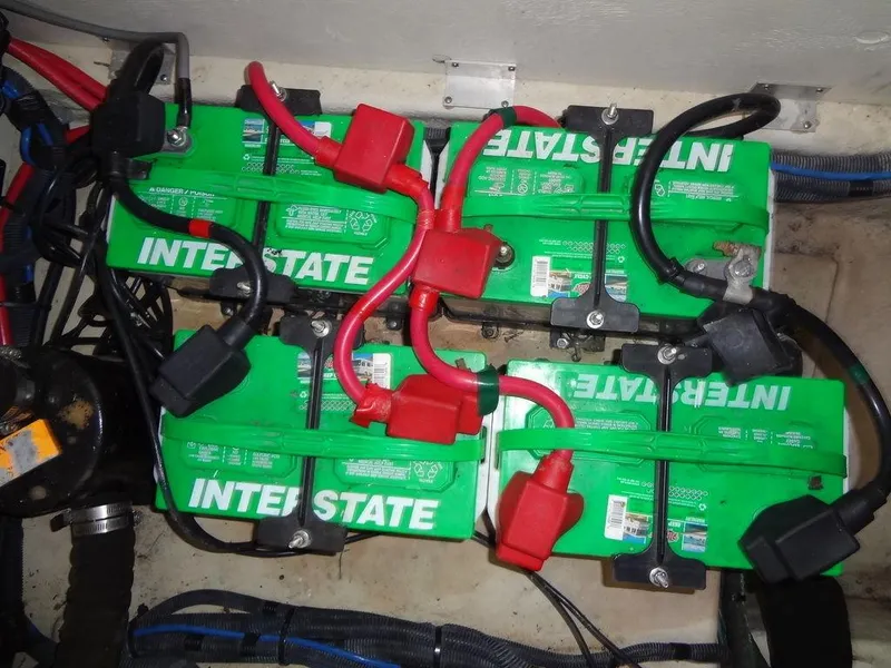Slide: The Image of Batteries in a 2005 Sea Ray 320 Sundancer boat engine compartment. - 40