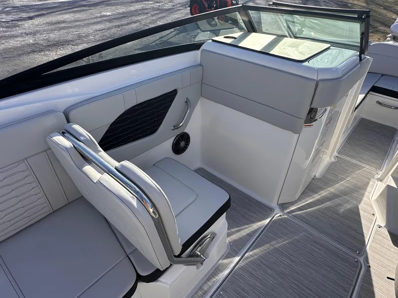 Slide: The Image of 2025 Sea Ray SPX 230 OB boat interior with modern seating and sleek design. - 3