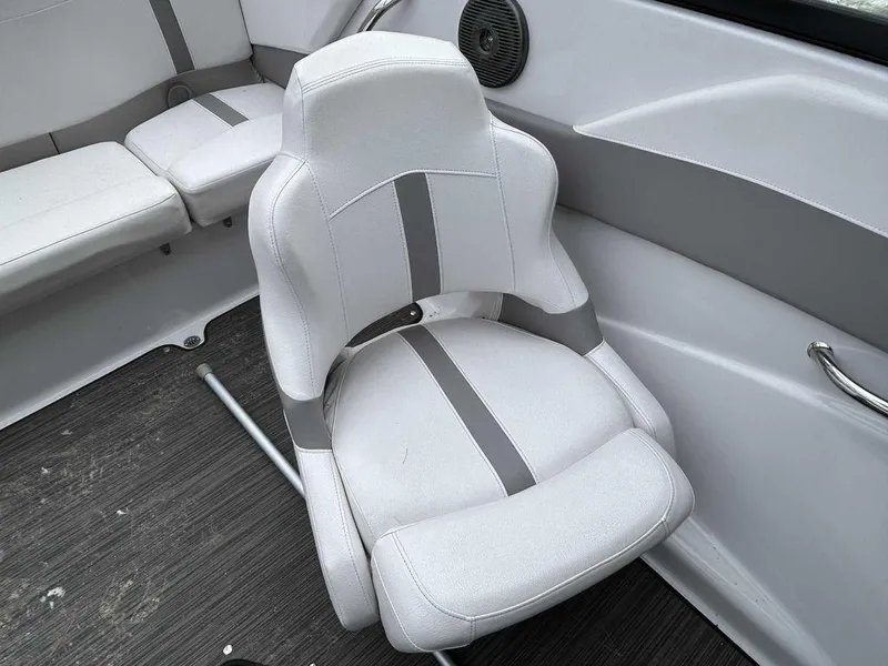 Slide: The Image of 2018 Four Winns Horizon 190 boat interior with white and gray seating. - 12