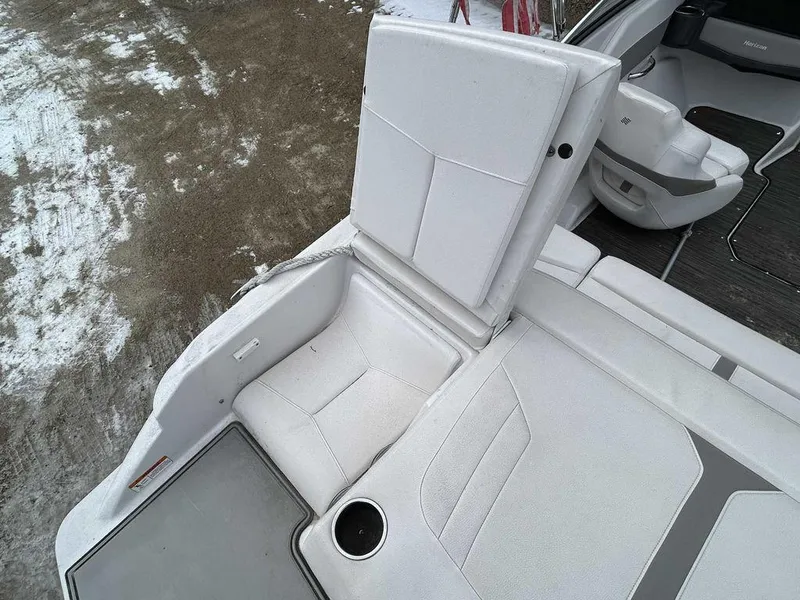 Slide: The Image of 2018 Four Winns Horizon 190 boat interior with white seating and cup holder. - 15