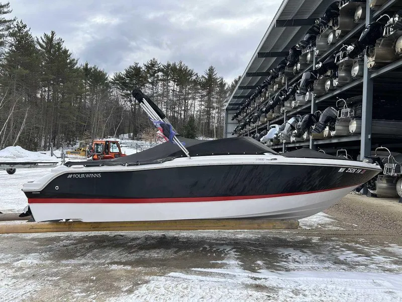 Slide: The Image of 2018 Four Winns Horizon 190 boat in storage, winter setting. - 5
