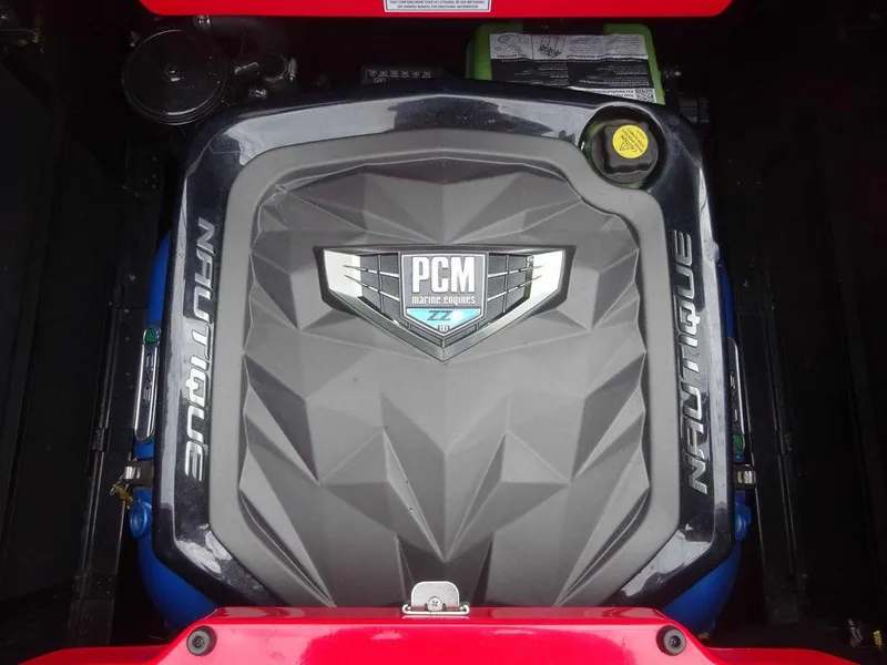 Slide: The Image of 2021 Nautique G23 PCM engine with distinctive cover design. - 16