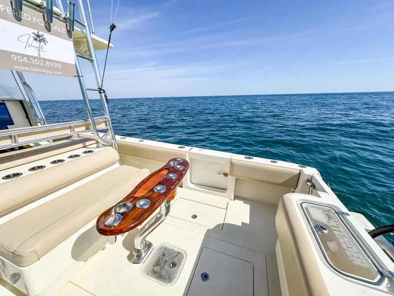 Slide: The Image of 2012 Contender 39 ST boat deck with ocean view and seating area. - 26