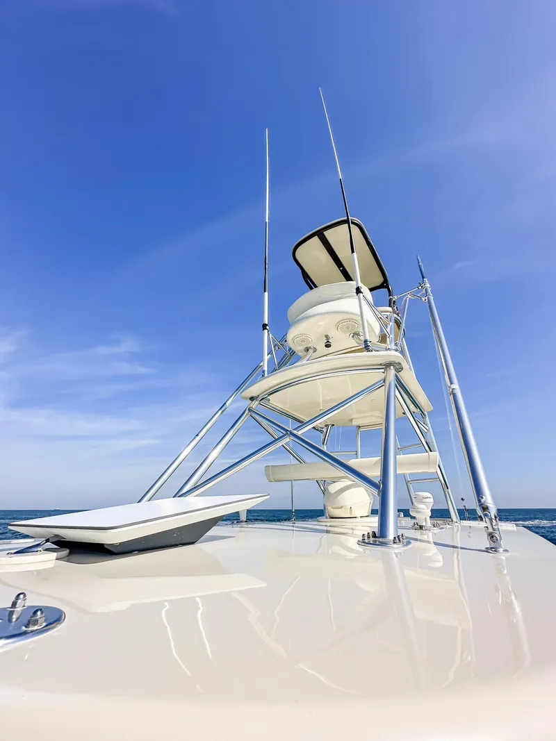 Slide: The Image of 2012 Contender 39 ST boat with tower against clear blue sky. - 29