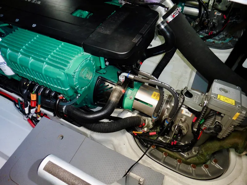 Slide: The Image of Engine compartment of a 2017 Jeanneau Leader 46 boat, showcasing detailed mechanical components. - 12