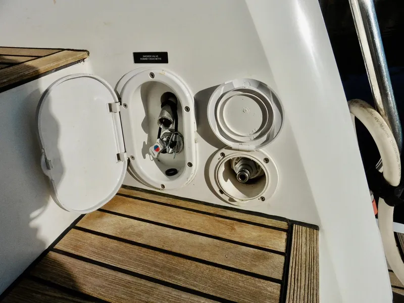 Slide: The Image of 2017 Jeanneau Leader 46 yacht deck with utility access panel and fittings. - 14