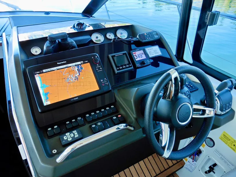 Slide: The Image of 2017 Jeanneau Leader 46 helm with navigation system and controls. - 22