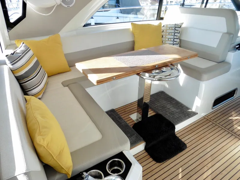 Slide: The Image of Luxurious interior of 2017 Jeanneau Leader 46 yacht with cozy seating and elegant table. - 29