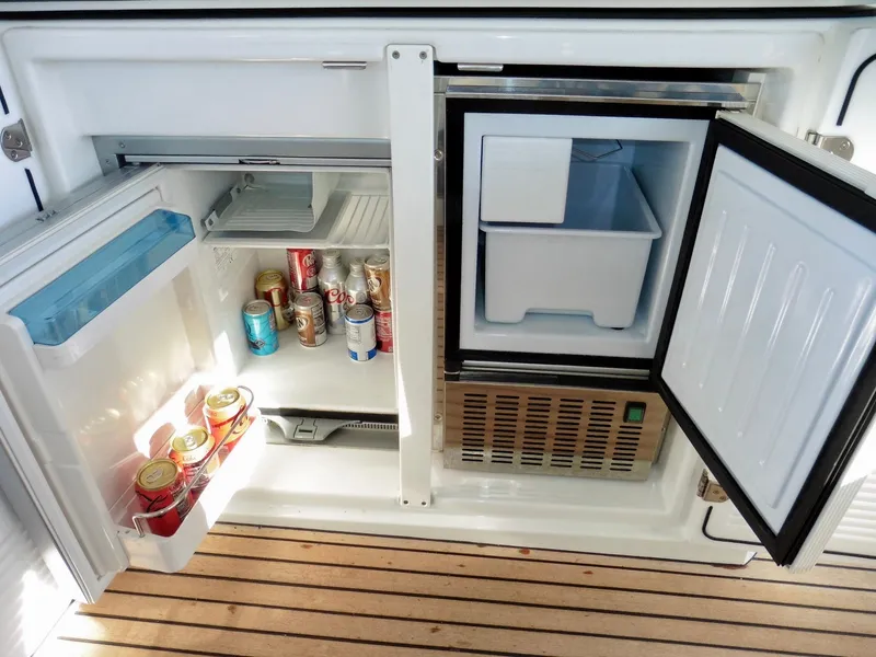 Slide: The Image of Refrigerator and freezer on 2017 Jeanneau Leader 46 yacht, stocked with beverages. - 36