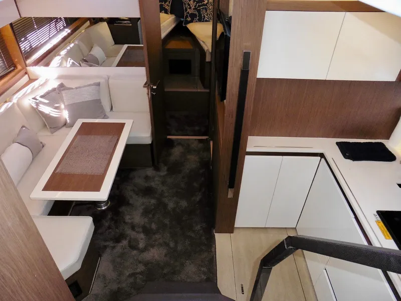 Slide: The Image of Interior of 2017 Jeanneau Leader 46 yacht with modern kitchen and dining area. - 41