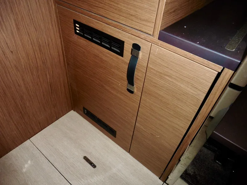 Slide: The Image of Wooden cabinet interior of 2017 Jeanneau Leader 46 yacht. - 47