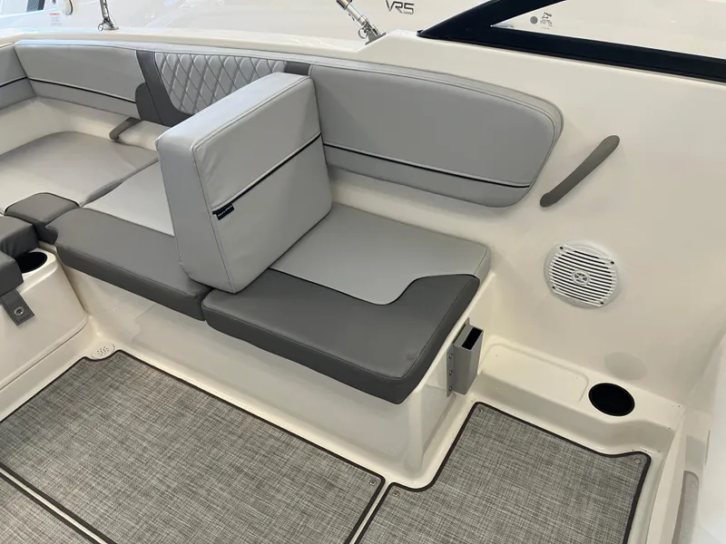 Slide: The Image of 2024 Bayliner VR4 Bowrider OB interior with gray seating and modern design. - 2