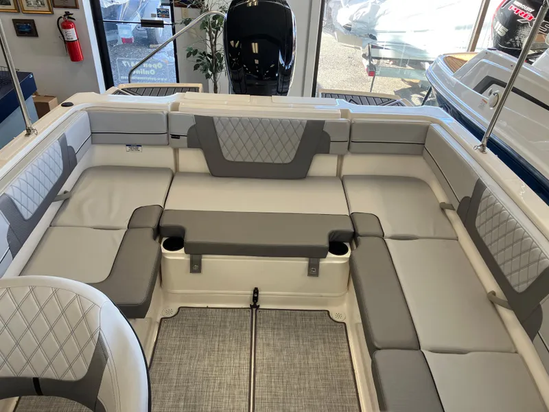 Slide: The Image of 2024 Bayliner VR4 Bowrider OB interior with spacious seating and modern design. - 6