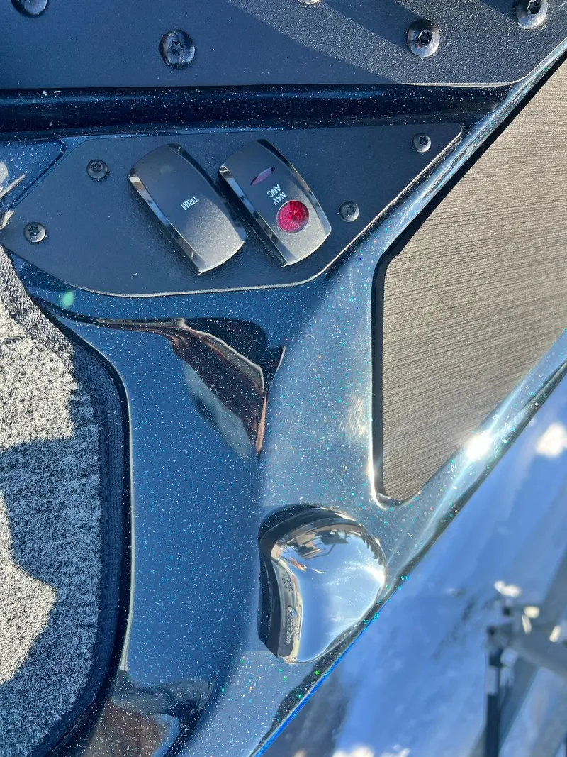 Slide: The Image of Close-up of 2025 Skeeter ZXR 20 SE boat controls with metallic finish. - 28