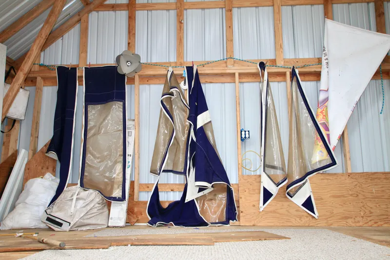 Slide: The Image of Stored boat covers for 1989 Tollycraft 34 Sport Sedan in a wooden shed. - 48