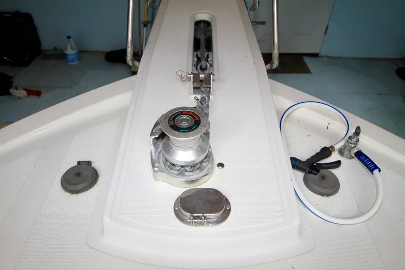 Slide: The Image of 1989 Tollycraft 34 Sport Sedan deck with winch and fittings. - 49