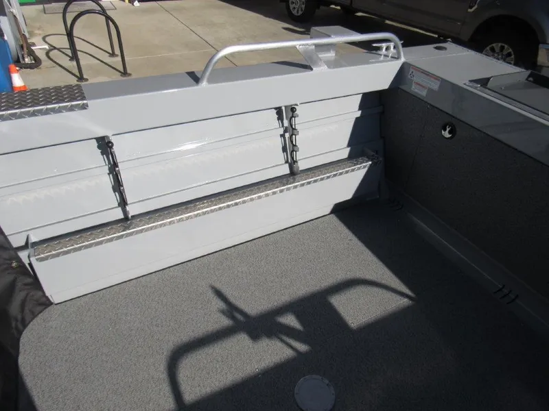 Slide: The Image of Interior view of 2025 Hewescraft 200 PRO V ET boat, featuring a clean, spacious deck area. - 10