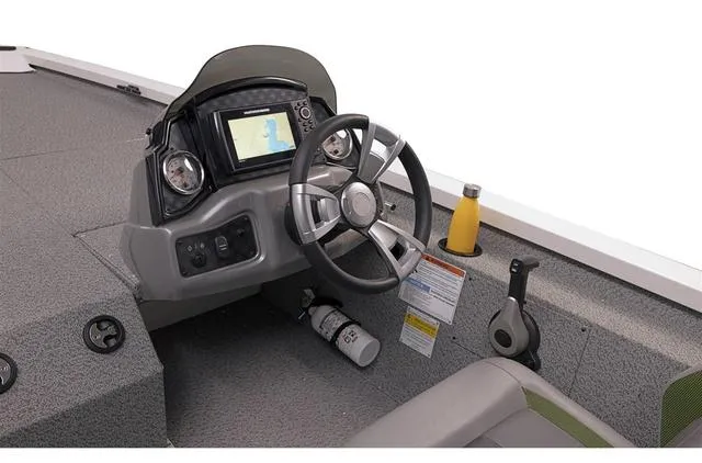 Slide: The Image of 2023 G3 Sportsman 1710 boat dashboard with steering wheel and navigation display. - 5