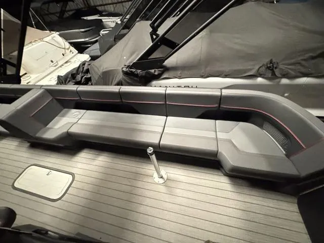 Slide: The Image of 2023 Manitou Explore 22 Max Bench with sleek seating and modern design. - 8