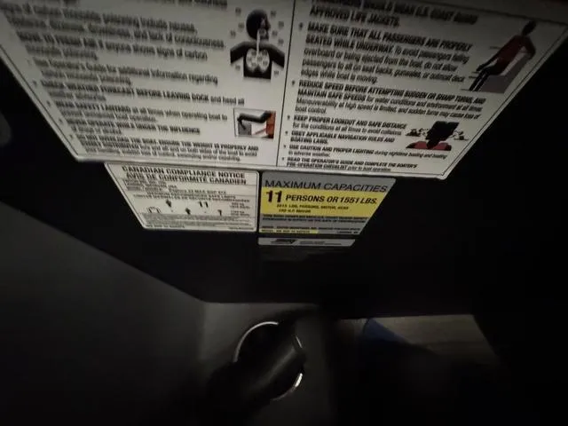 Slide: The Image of Safety and capacity labels on 2023 Manitou Explore 22 Max Bench, indicating 11-person limit. - 9