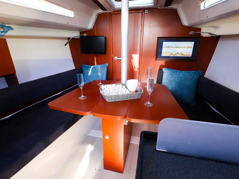 Slide: The Image of Interior of 2018 Hanse 315 yacht with cozy seating and elegant decor. - 14