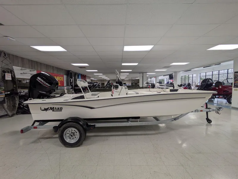 The Image of 2025 Mako Pro Skiff 17 CC boat displayed in a showroom. - 0