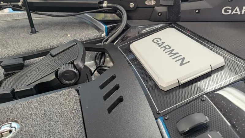 Slide: The Image of 2025 Triton 20XP Patriot boat with Garmin navigation system, featuring sleek design and advanced technology. - 3