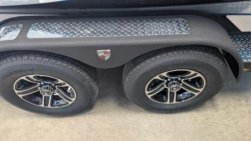 Slide: The Image of 2025 Triton 20XP Patriot trailer with dual black alloy wheels and diamond plate accents. - 6